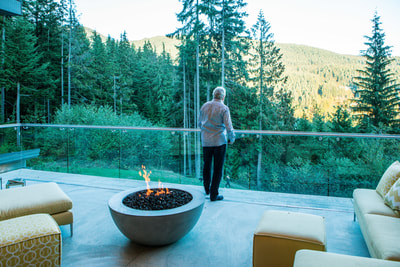 Guest enjoying the view at the TEN80 Luxury Net Zero Networking Event. Energy efficiency, tesla powerwall, green building, rainwater harvesting, luxury listing for sale.